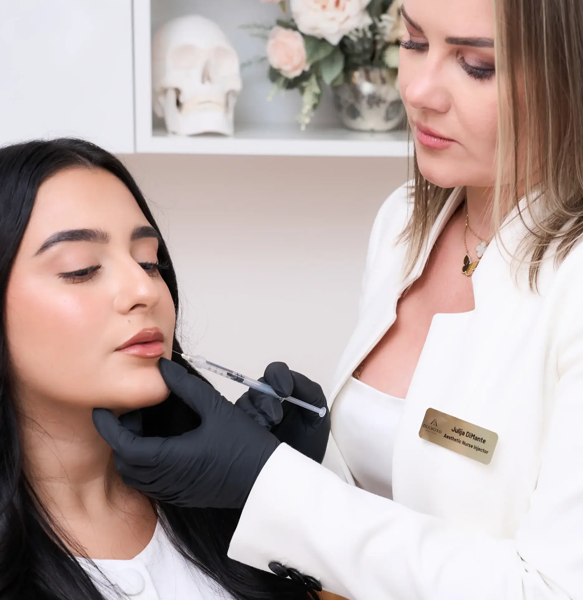 Esthetician injecting filler on patient lips | Diamond Advanced Aesthetics | New York, NY
